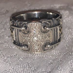 Silver ring with gold and diamond chip accents